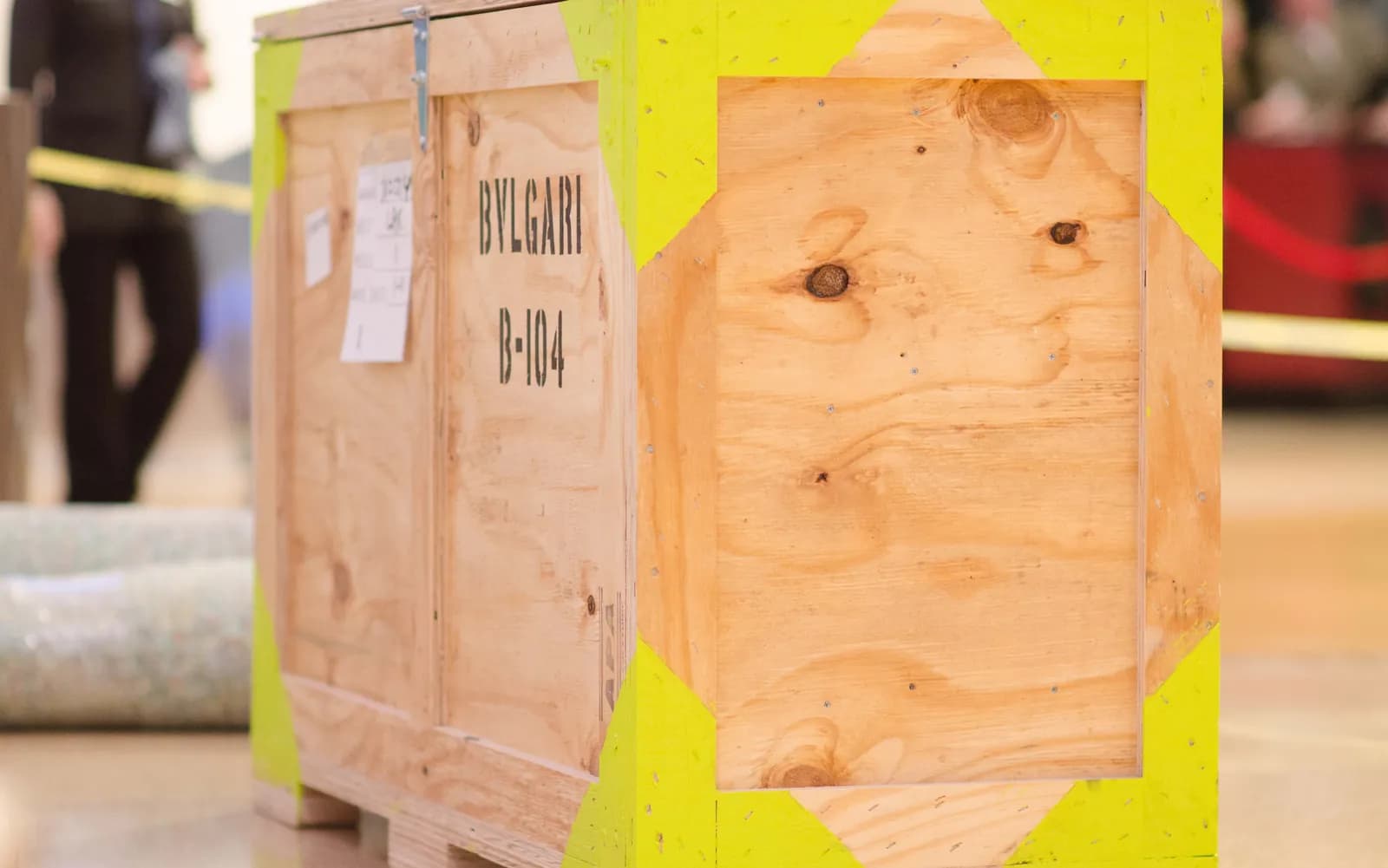 Custom plywood shipping crate labeled for a Bulgari installation on site