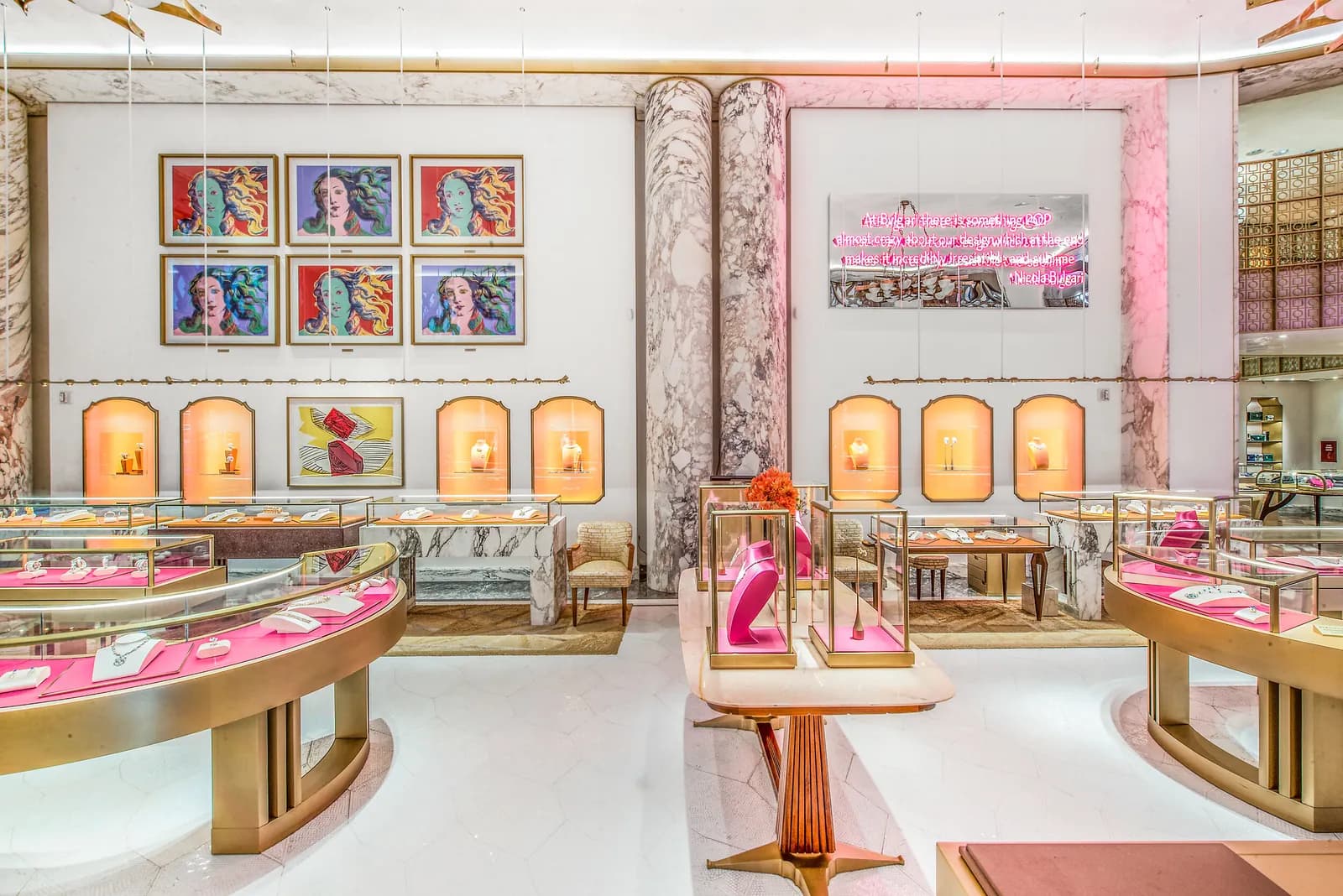 Bulgari Wild Pop interior with a Warhol-inspired portrait wall above jewelry cases
