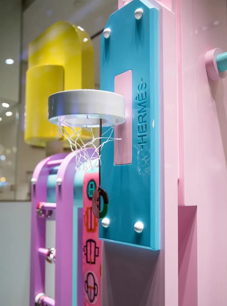 Detail of pastel Hermès window sculpture with hoop and fabricated panels