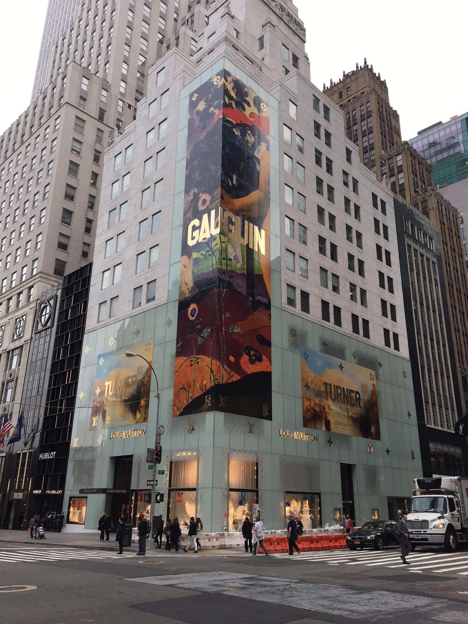 Louis Vuitton corner facade with multi-story large-format painting prints